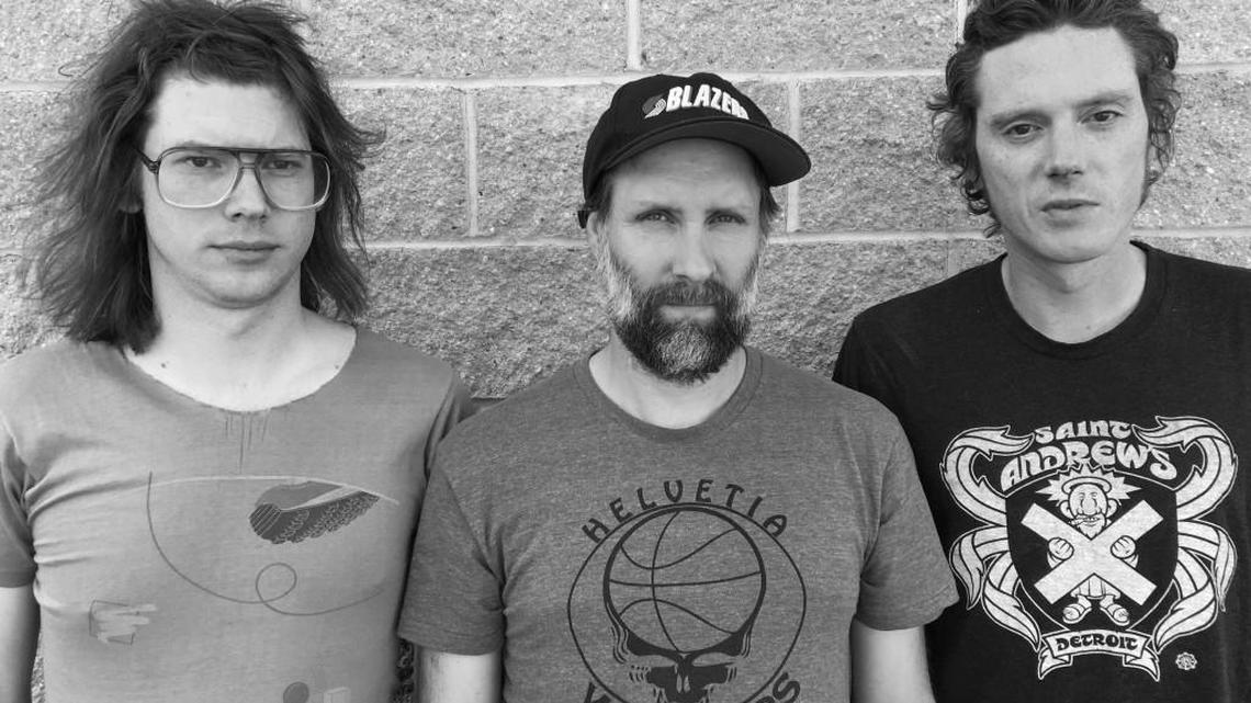 Built to Spill (drummer Steve Gere, from left, guitarist and vocalist Doug Martsch, and bassist Jason Albertini) postponed Friday’s Olympia show at the Capitol Theater.