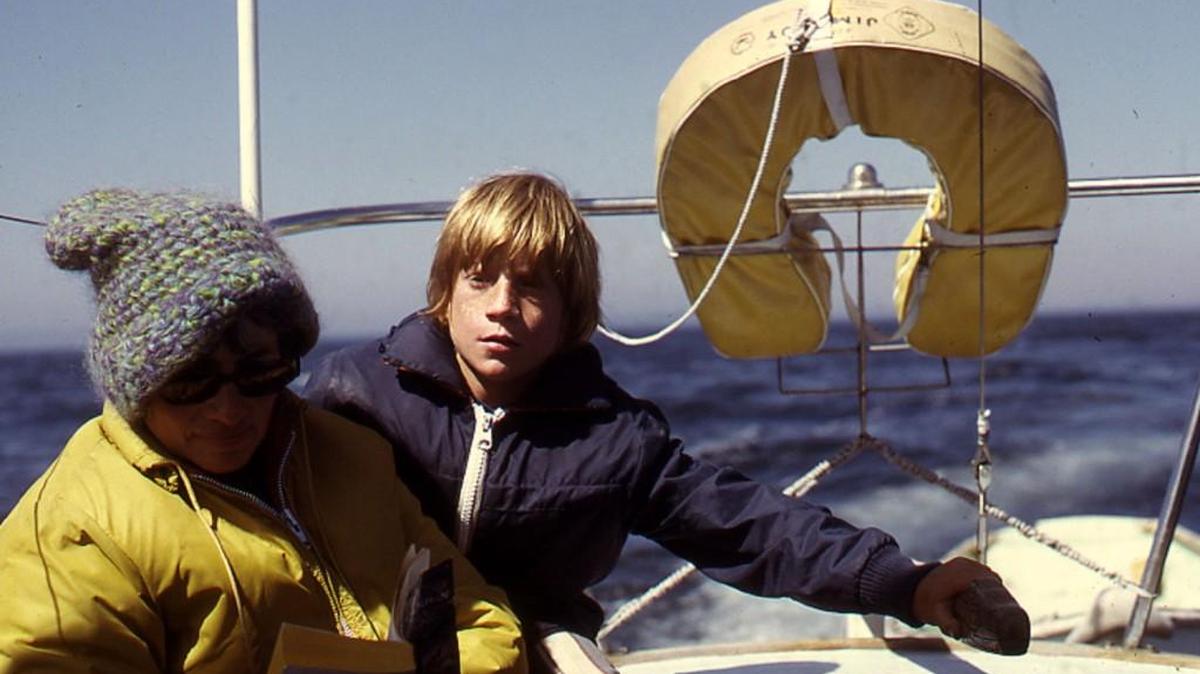 Author Jim Lynch, at age 11, sailing in the Puget Sound with his mother, Janet Lynch.