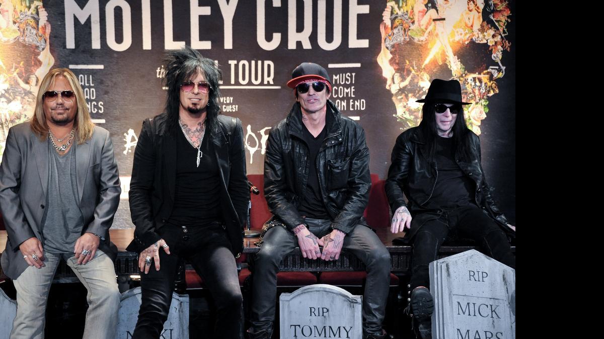 
Members of Mötley Crüe, from left, Vince Neil, Nikki Sixx, Tommy Lee and Mick Mars, pose during a press conference in Los Angeles in 2014. The band’s farewell concert tour stops in Tacoma on Friday (July 24).
