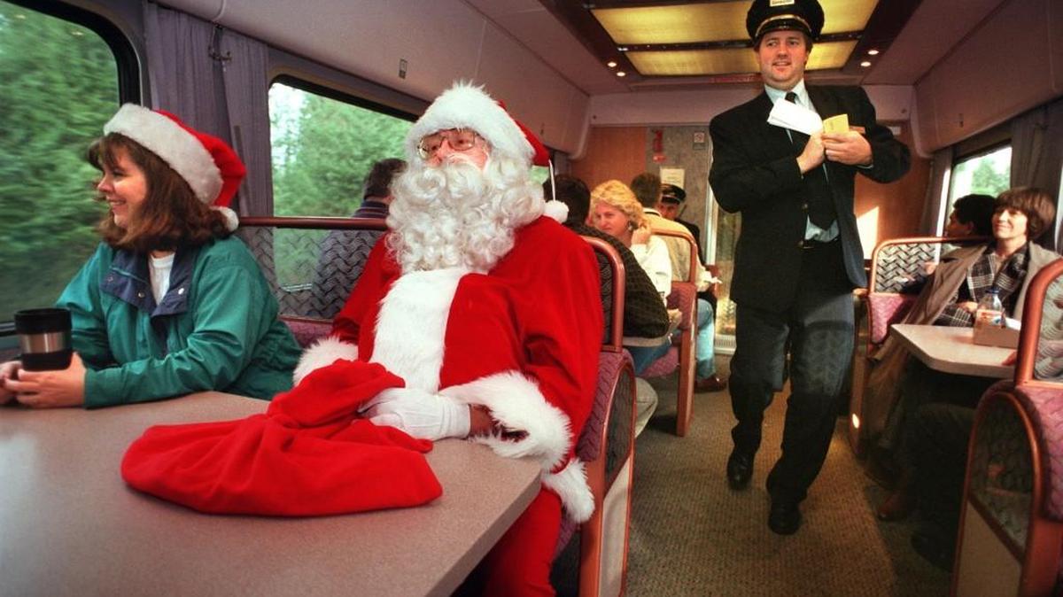 FILE PHOTO: Santa Claus and his wife ride the train from Vancouver, Wash., to the Olympia-Lacey Amtrak Centennial Station. He’ll make a stop in Lacey again Saturday.