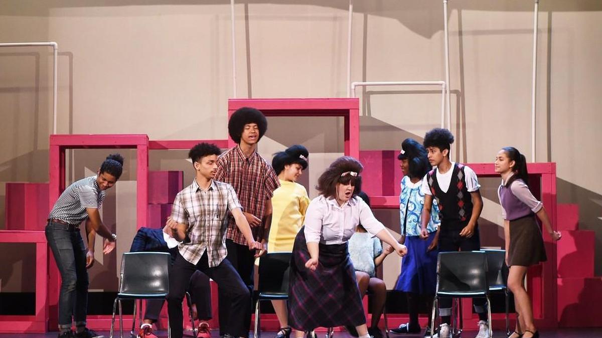 Cast members of “Hairspray” sing “Run and Tell That” during their Monday rehearsal at the Capitol Theater in downtown Olympia. The play is directed by Heidi Fredericks and produced by Apple Tree Productions. The theater, home to the Olympia Film Society, hasn’t hosted a theater group since Capital Playhouse did productions there in the late ’80s and early ’90s.