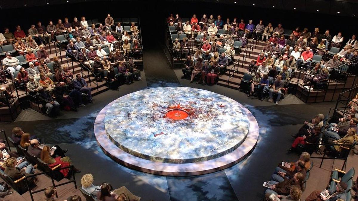 The interior of the Oregon Shakespeare Festival’s Thomas Theatre in a round configuration in 2000 during a performance of “Macbeth.”