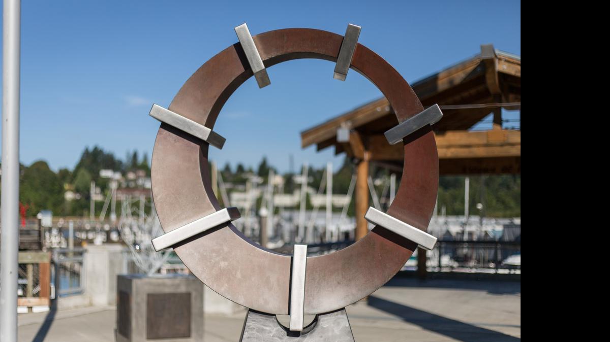 
The steel and bronze sculpture “Twisted Halo” by Ulrich Pakker is on display at the State Street Pavilion at Percival Landing in Olympia.
