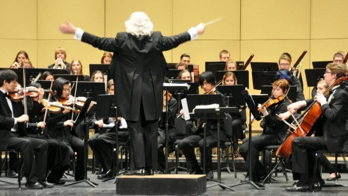 Conservatory Orchestra under the direction of John Welsh.