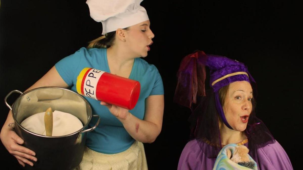 Elizabeth Alexander, left, portrays the cook while Samantha Chandler plays the Duchess in Olympia Family Theater’s production of “Alice in Wonderland.”