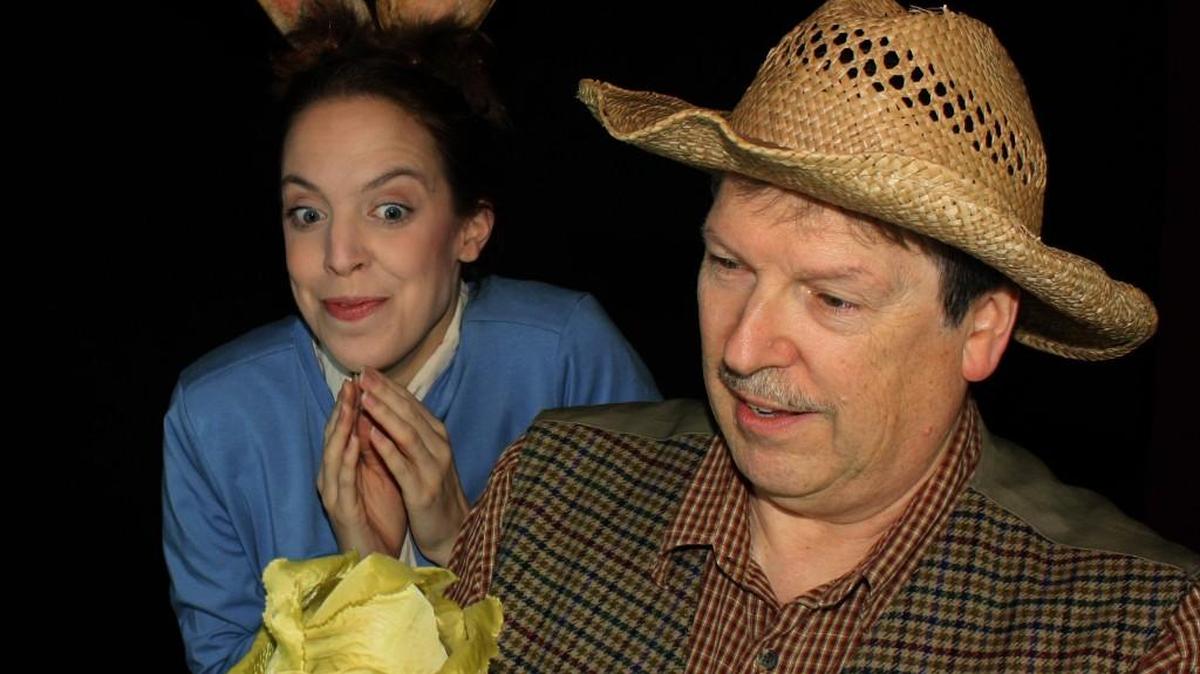 Carolyn Willems Van Dijk plays Peter Rabbit along with Rich Young as Mr. McGregor in Olympia Family Theater's latest production, “Peter Rabbit and Me.”