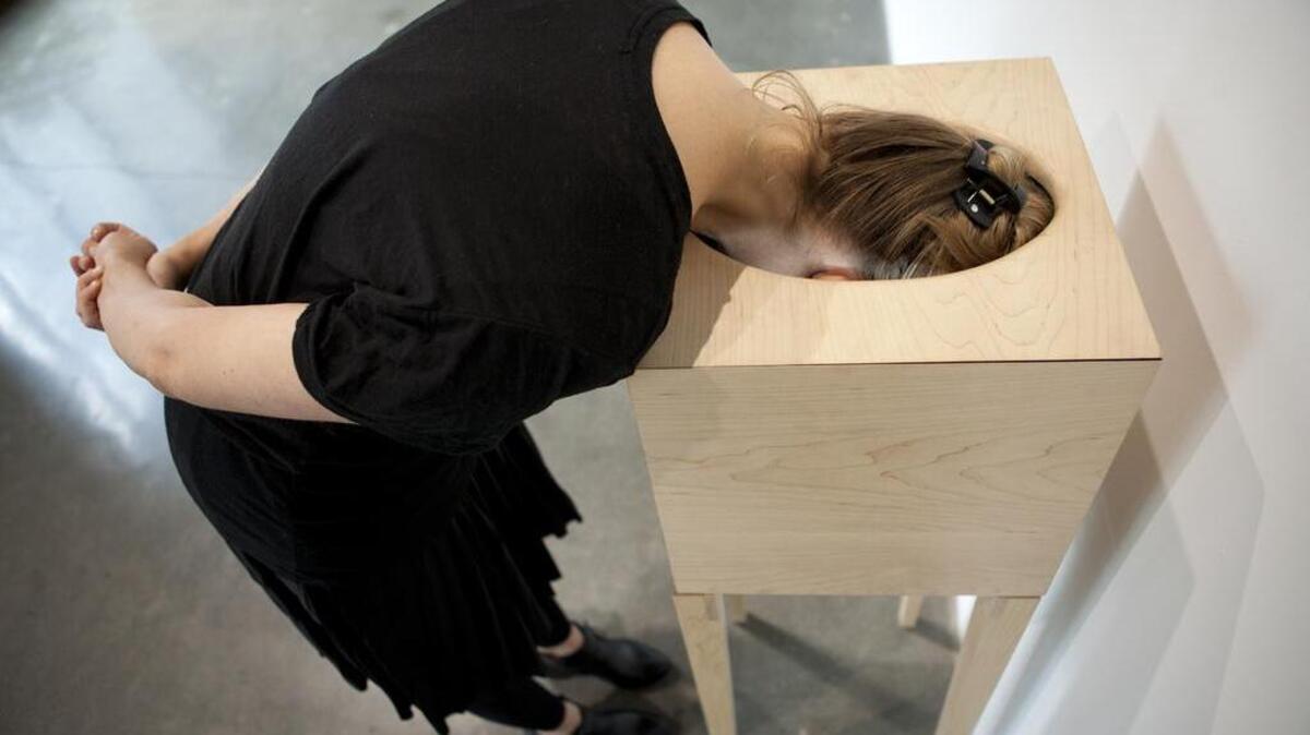 In “Head in the Sand,” artist Margaret Noble invites visitors to inhabit her sculpture.