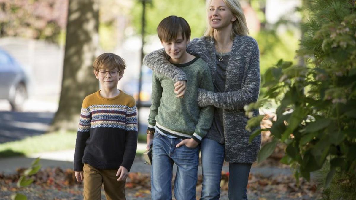 This image released by Focus Features shows Jacob Tremblay, from left, Jaeden Lieberher and Naomi Watts in a scene from “The Book of Henry.”