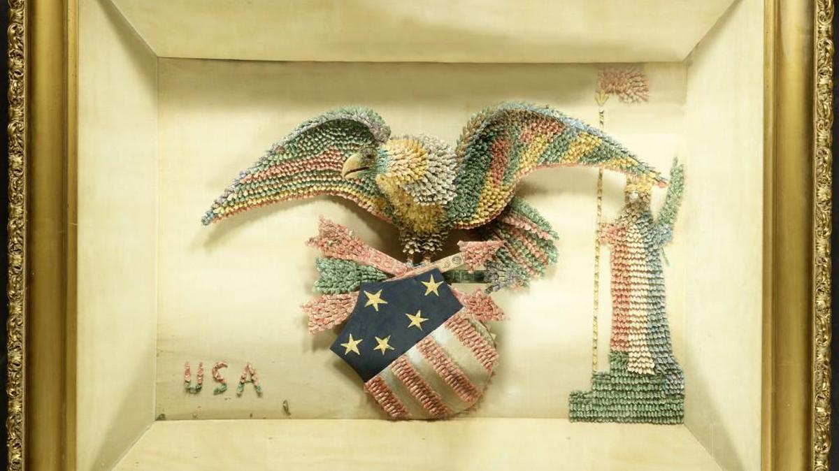 This framed three-dimensional collage was created by Sarah E. Erickson of Grand Mound in 1914 out of rolled postage stamps, natural bird’s beak, and magazines. It features an eagle, shield, arrows, USA initials, and Statue of Liberty. This piece was displayed in the Washington State exhibit at the Panama-Pacific International Exposition in San Francisco in 1915, and later at the Washington State Capitol in Olympia.