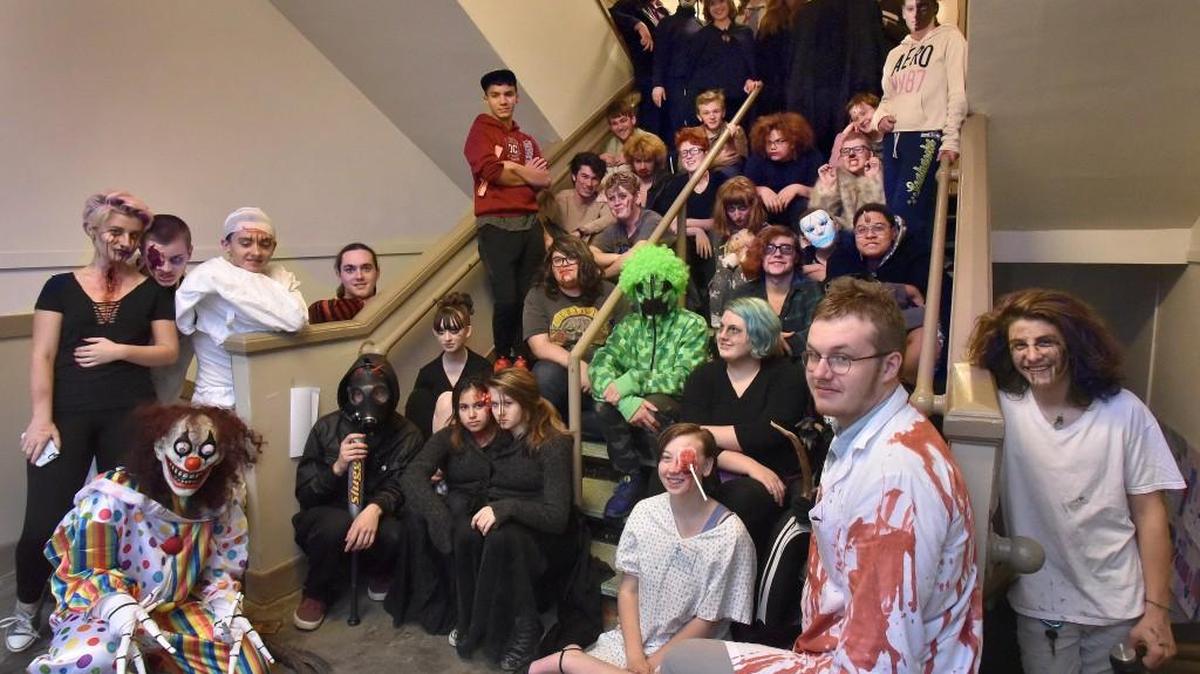 Ghouls gather for a team photo at Avanti High School Thursday Oct 19th and minutes before the doors creak open during Olympia school’s fourth annual Halloween Haunted School, which will run from 5:30 to 8:30 p.m., Thursdays through Saturdays until Oct. 28. Admission is $7. Once again the proceeds benefit the school’s annual student trip to the Oregon Shakespeare festival. Avanti is located in the Knox Administrative Center, 1113 Legion Way SE in Olympia.