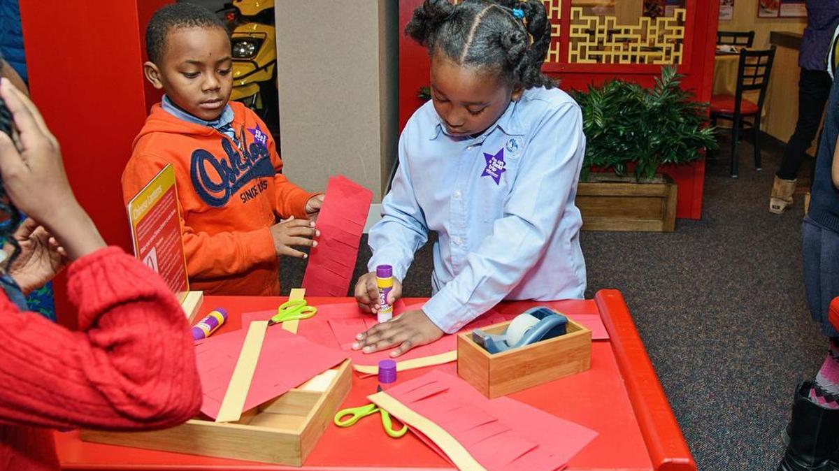 Hands On Children’s Museum visitors can taking part in activities at the “Children’s China” exhibit.