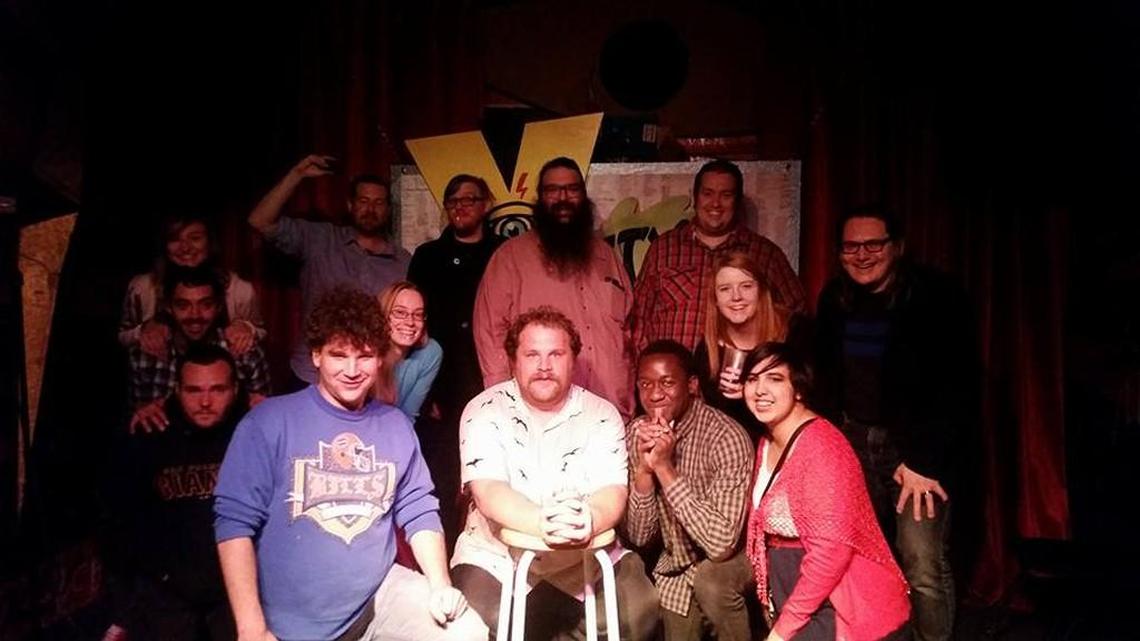 Comedian Sam Miller, center, along with other comedians at his weekly comedy show.