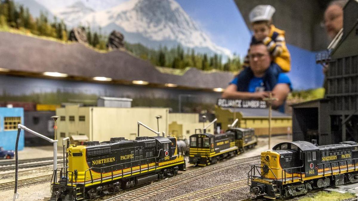Nathan and Jordan Richardson of Auburn get a behind-the-scenes view of the Puget Sound Model Railroad Engineers exhibit at the 2015 Model Train Festival at the Washington State History Museum in Tacoma.