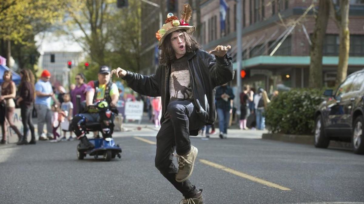 Ari Turko of Olympia dances down Franklin Street during the opening evening of Arts Walk last spring.