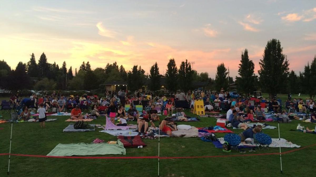 The crowd waits for the movie begin at Tumwater’s Screen on the Green.