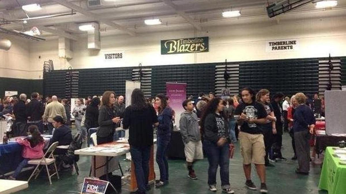 Participants mingle during the North Thurston Public Schools Career and College Fair in Oct. 2013 at Timberline High School. The annual event returns on Oct. 23.