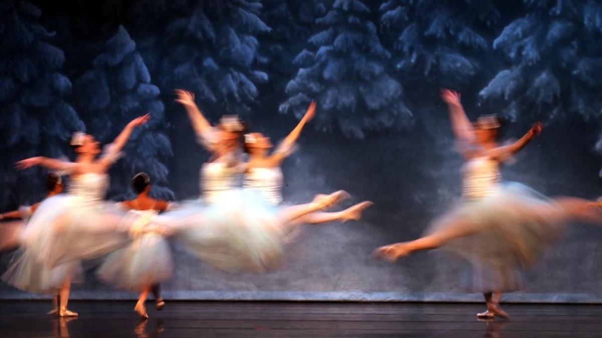Snow dancers leap across the stage during a 2013 performance of Ballet Northwest’s Nutcracker.