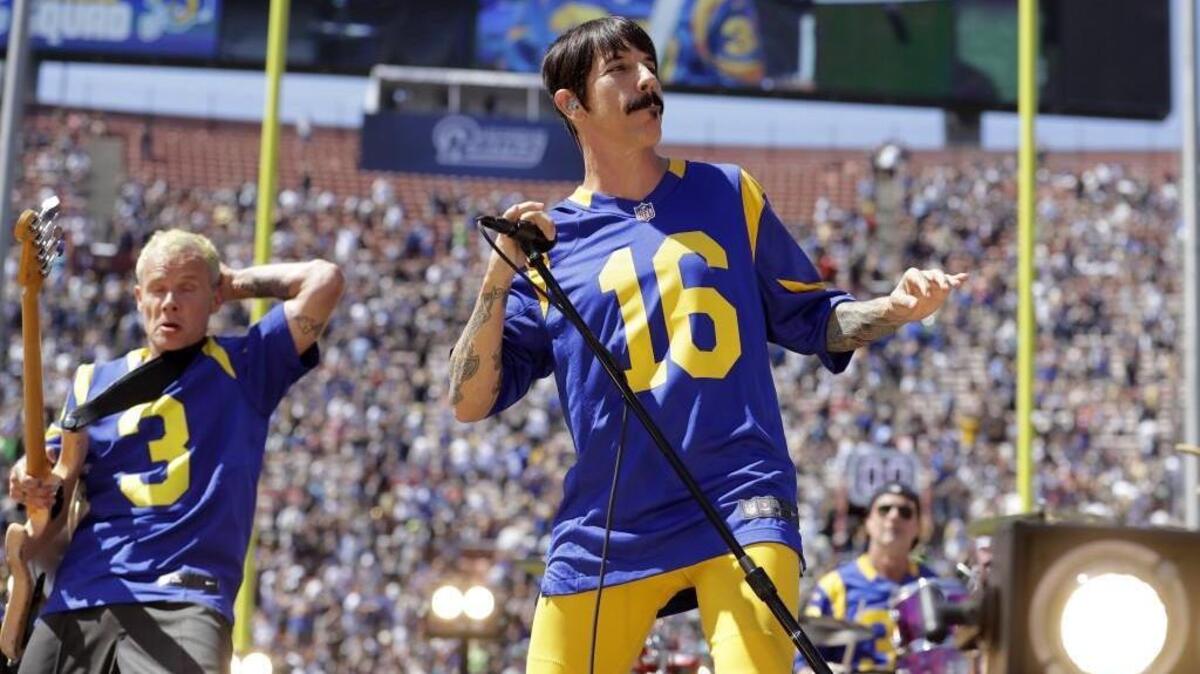 The Red Hot Chili Peppers perform prior to an NFL football game between the Los Angeles Rams and the Seattle Seahawks Sunday in Los Angeles. On Monday, the band announced a 2017 North American tour, including a March 17 concert in Seattle.