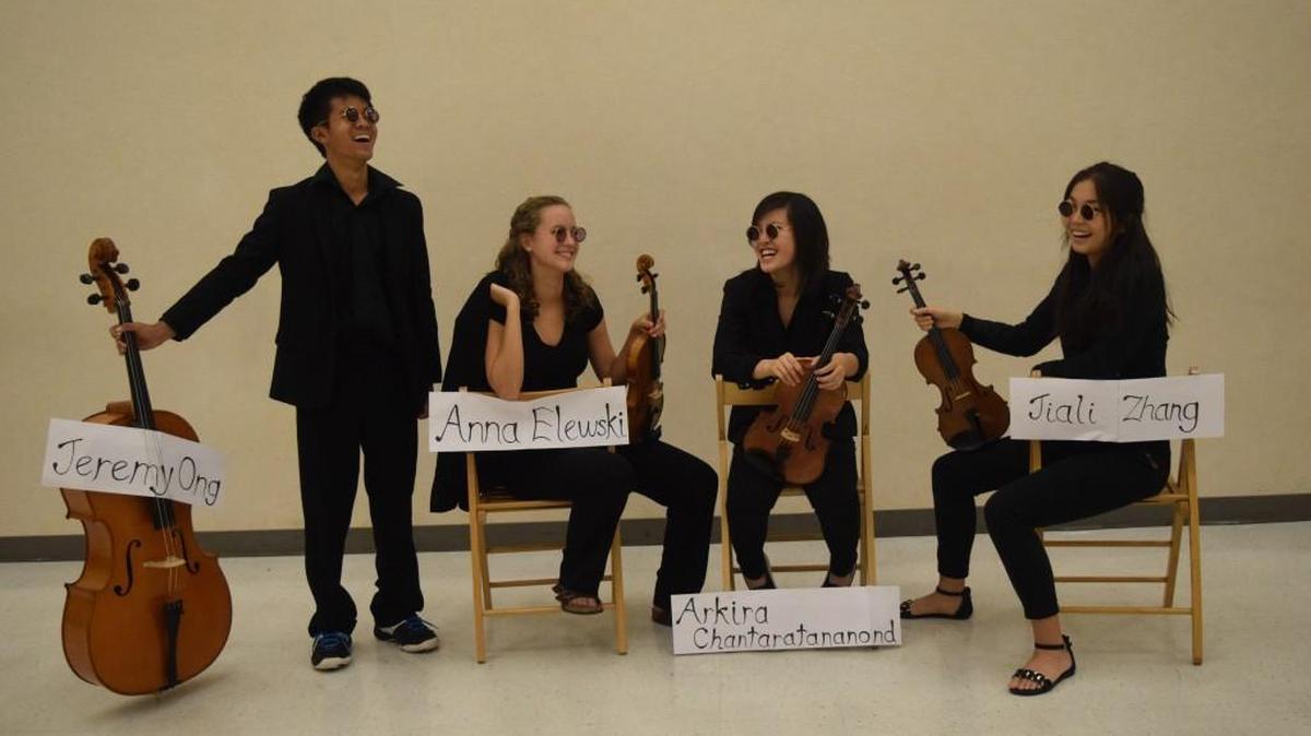 
Olympia High musicians, from left, Jeremy Ong, Anna Elewski, Arkira Chantaratananond and Jiali Zhang will perform as part of the Beatles tribute show.


