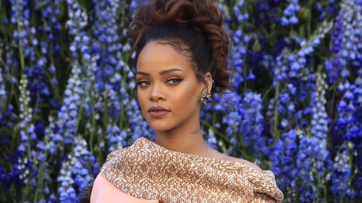 Singer Rihanna poses before Christian Dior’s Spring-Summer 2016 ready-to-wear fashion collection on Oct. 2, 2015, in Paris.