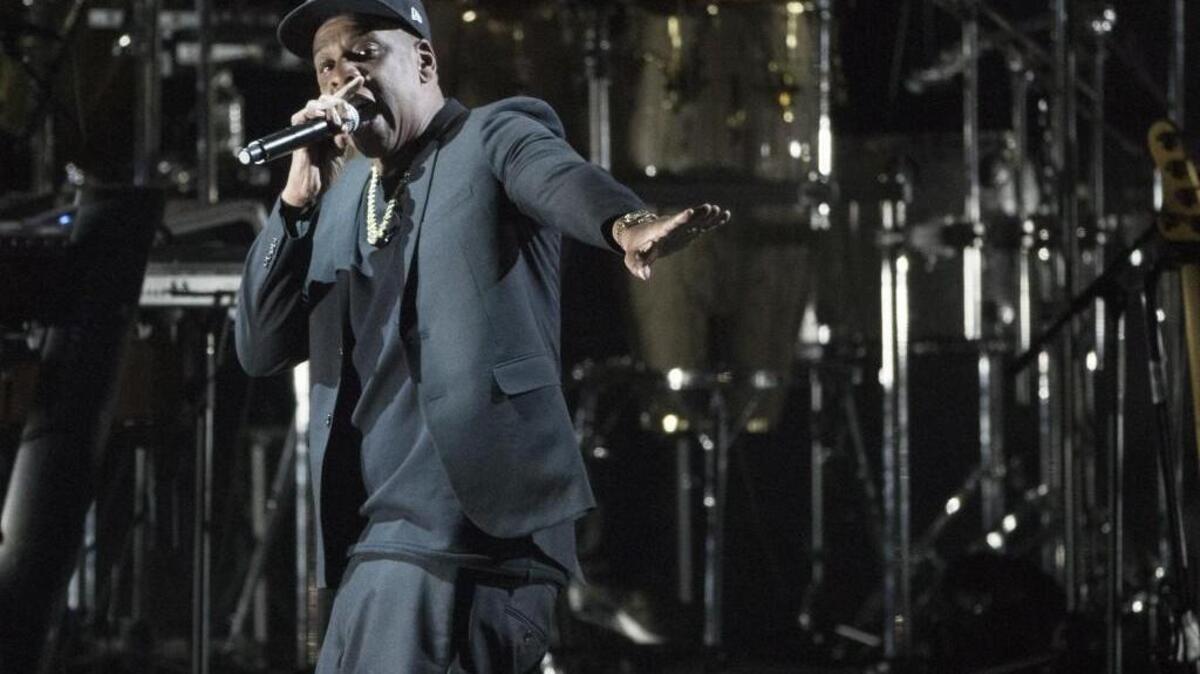 Jay Z performs during a campaign rally for Democratic presidential candidate Hillary Clinton in Cleveland in November. He will play KeyArena in December.