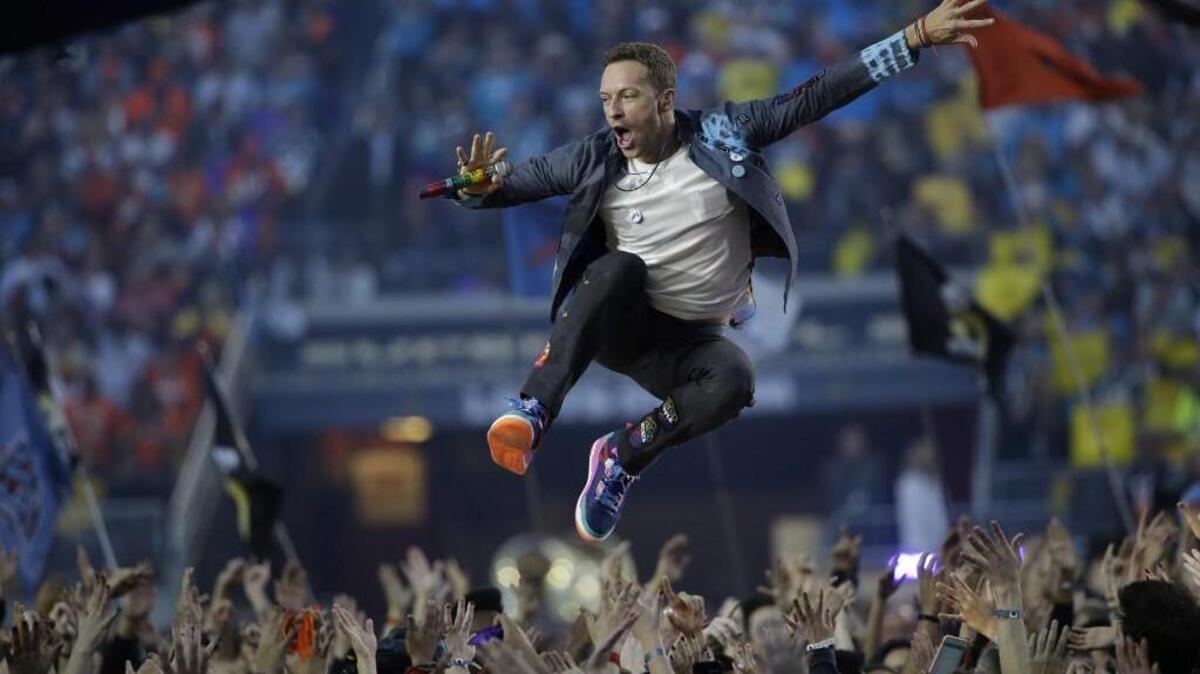 Coldplay singer Chris Martin performs during halftime of Super Bowl 50 in January. Coldplay announced Friday part of its 2017 North American tour will include a concert Sept. 23 at CenturyLink Field.