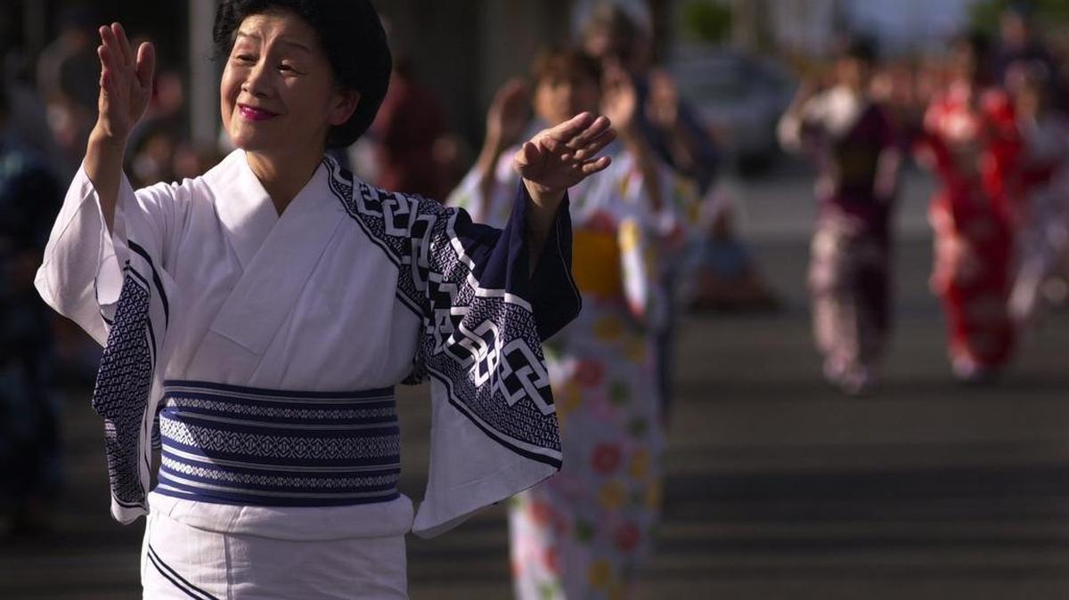 C1, 10.08.2003; Mary Ohno, director of the Kabuki Academy, a classical Japanese dance studio, in Tacoma dances to the first dance song of the evening, Tankoo Bushi at Olympia’s Bon Odori Festival Satruday evening. Adam Amato/The Olympian