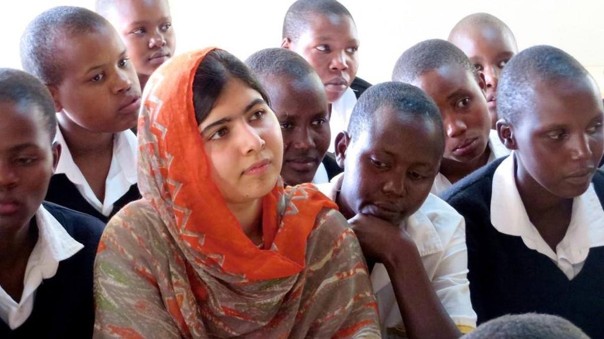 
Malala Yousafzai, front, visit the at the Kisaruni Girls School in Massai Mara, Kenya, in May 2014. Yousafzai is the subject of the documentary film, “He Named Me Malala.” 
