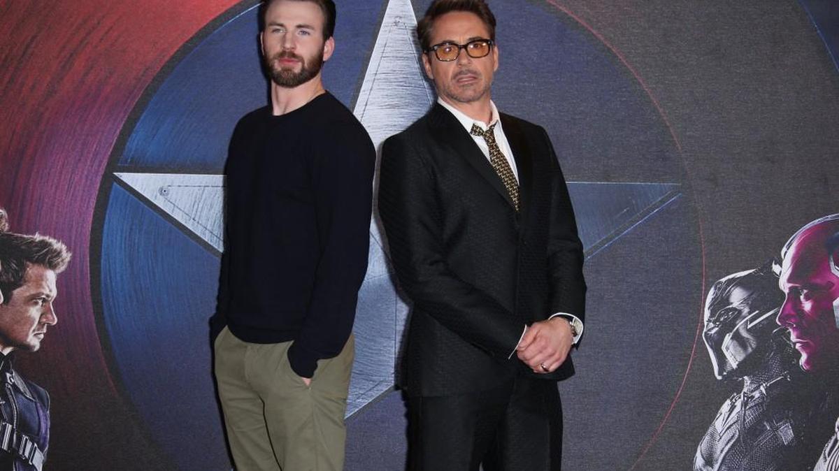 The portrayal of Captain America by Chris Evans, left, pushes him over Robert Downey Jr. and his Iron Man to the top of the Marvel Cinematic Universe.