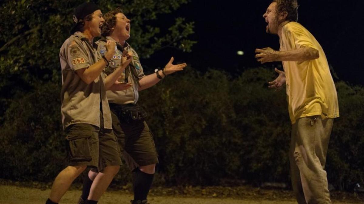 Tye Sheridan, left, and Joey Morgan encounter a zombie in “Scouts Guide to the Zombie Apocalypse.”