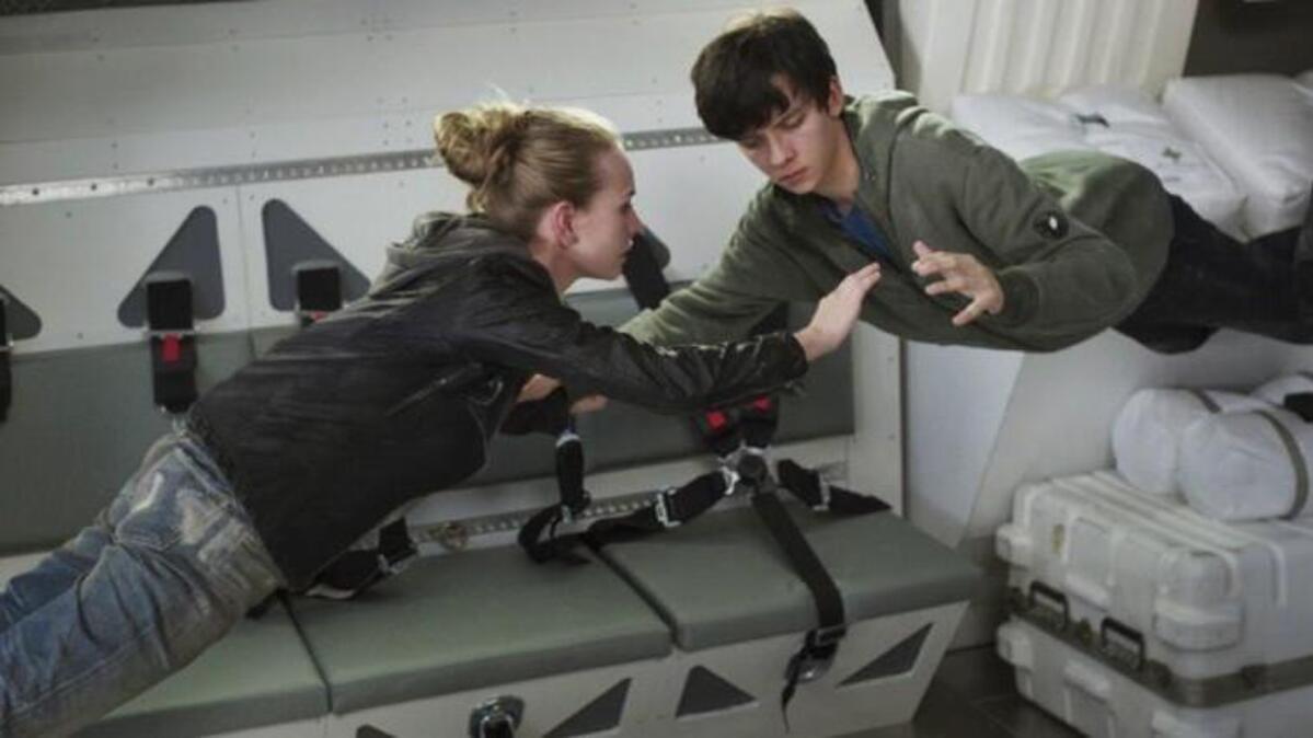 Britt Robertson and Asa Butterfield meet, steal cars, get weightless and fall in love in “The Space Between Us.”