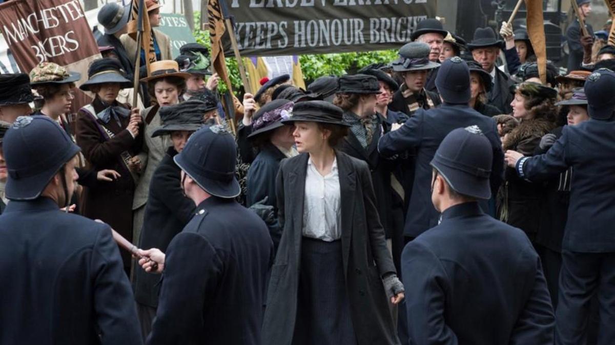 Carey Mulligan, center, in the middle of a protest in “Suffragette.”