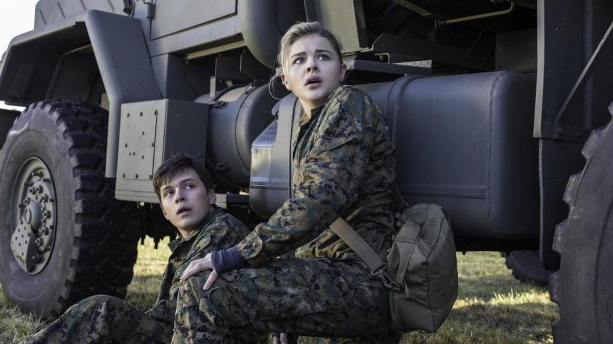 Nick Robinson, left, and Chloë Grace Moretz in star in newly released science fiction adventure “The 5th Wave.”