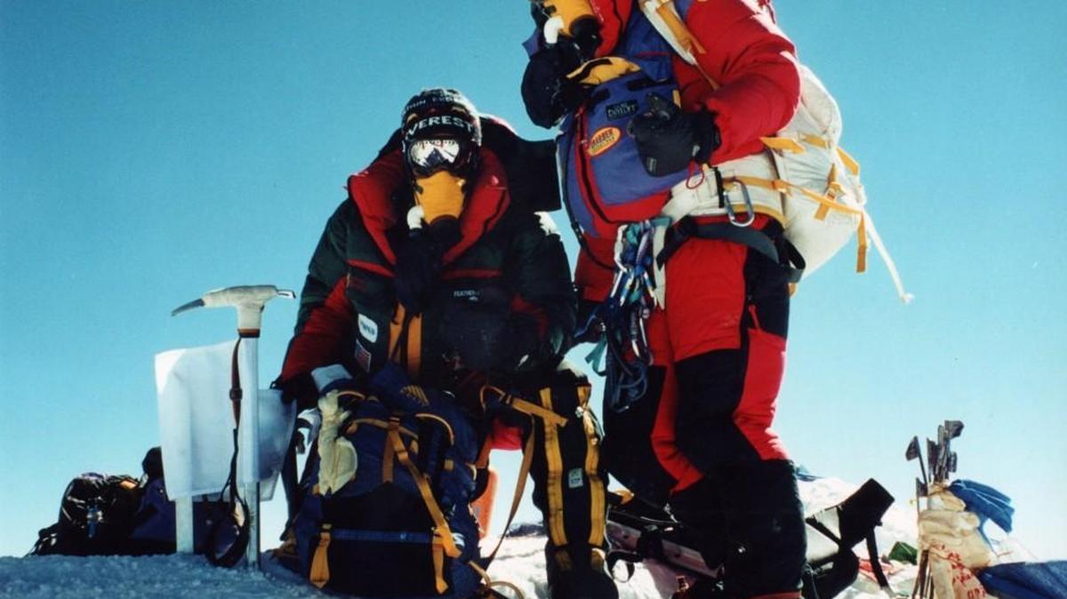 
Jason Edwards, right, stands in May 2001 on top of Mount Everest.
