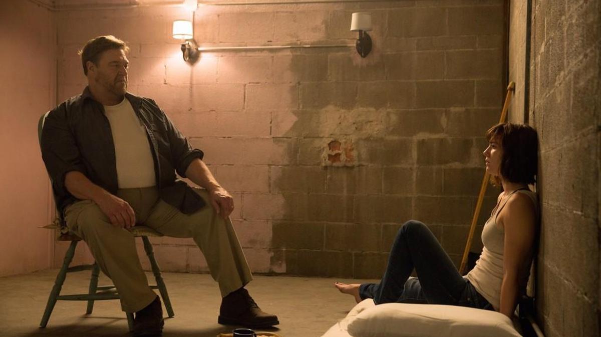 John Goodman, left, and Mary Elizabeth Winstead, right, in “10 Cloverfield Lane.”
