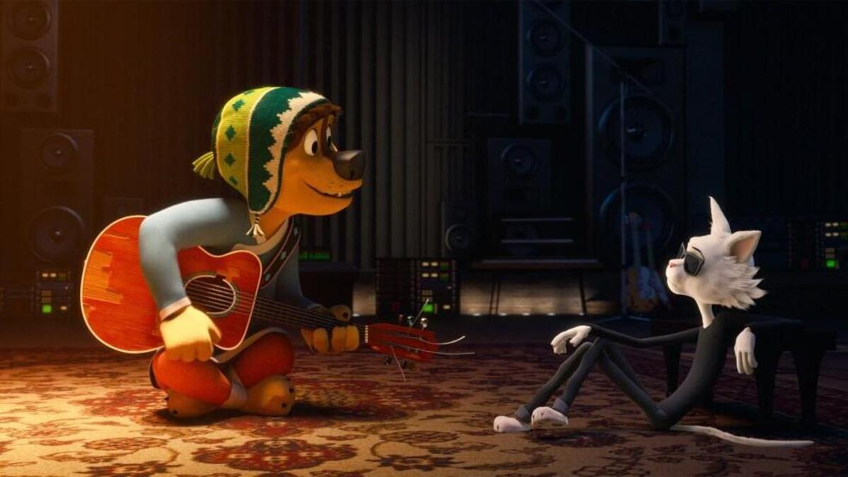 Luke Wilson provides the voice for Bodi, left, and Eddie Izzard voices Angus Scattergood in “Rock Dog.”
