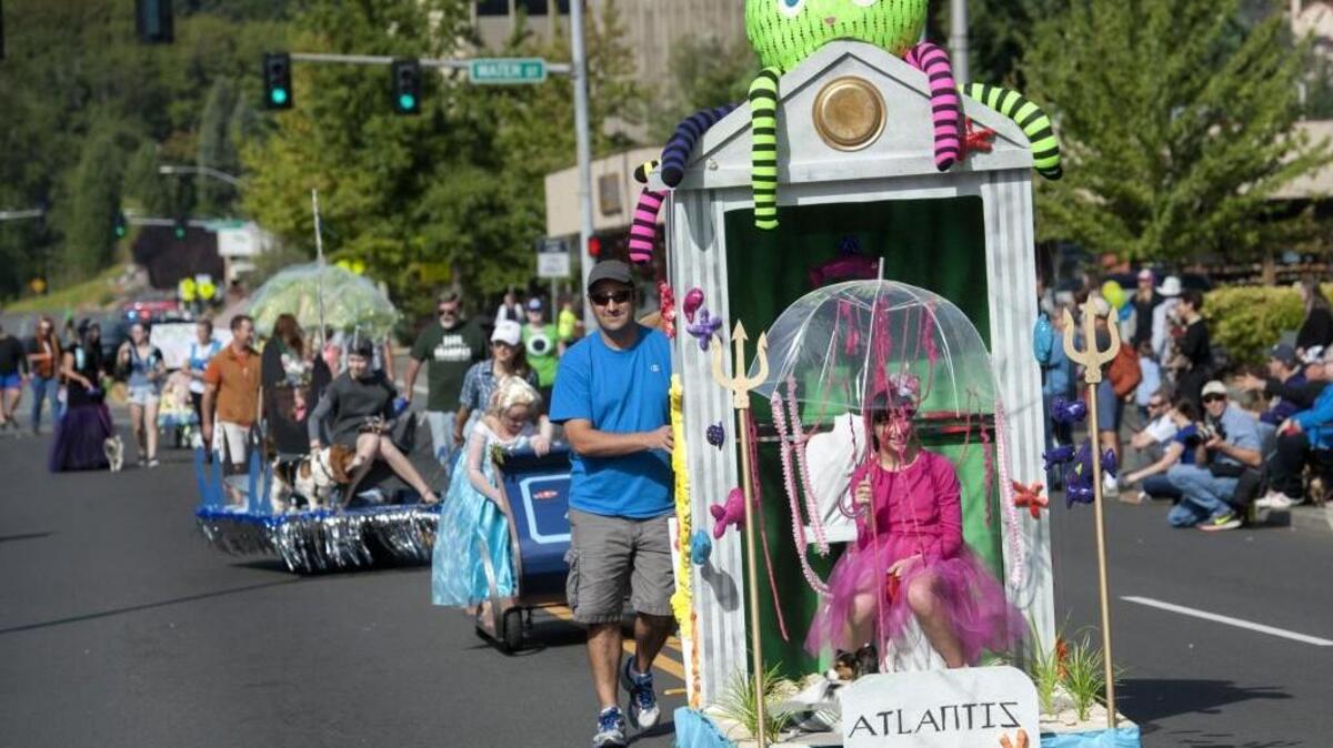 Floats stocked with kids and critters provided the finale of the 2015 Pet Parade in Olympia.