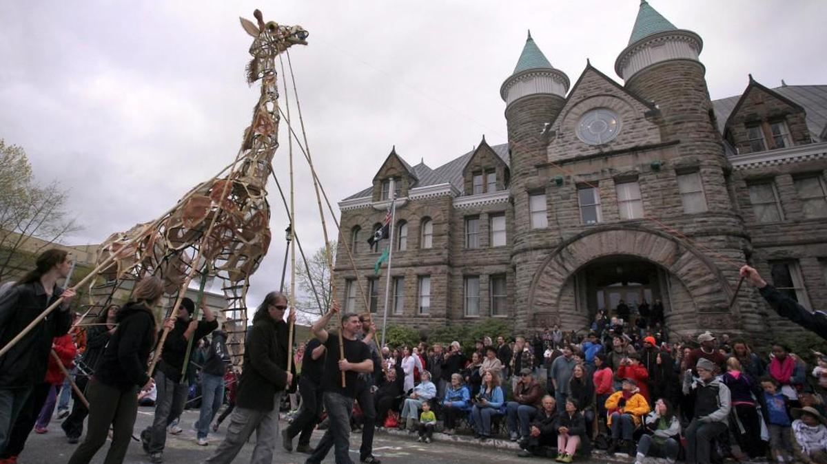 A 21-foot-tall giraffe designed by Jerry Berebitsky was the tallest entry ever in the Procession of the Species, shown here in 2013.