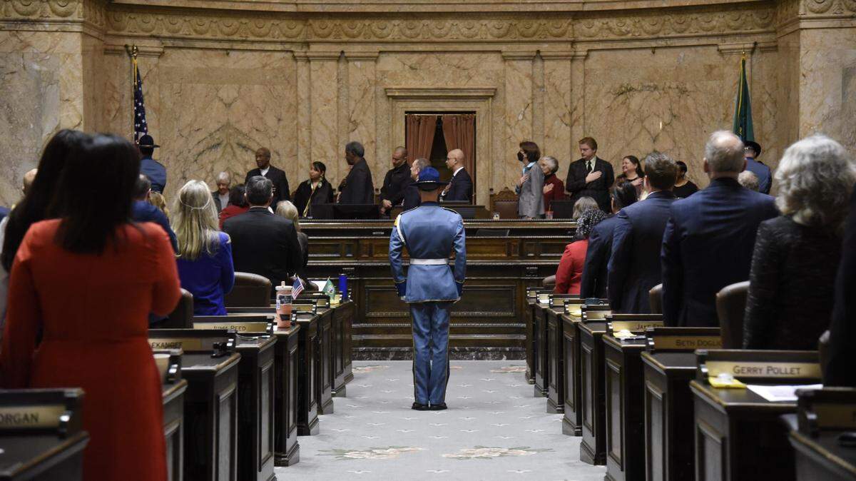 The Washington State Patrol present the colors during the first convening of the 2023 Legislative session in the House of Representatives chambers. The 105-day legislative session ends April 24.