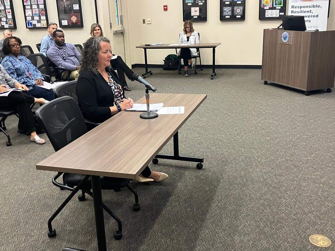 District 3 school director applicant Sarah Tracy answers questions posed to her by the North Thurston Public Schools board Tuesday night.