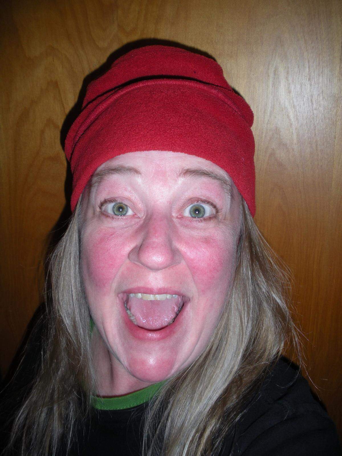 In her red hat, Elizabeth Lord looks holiday-ready all winter long.