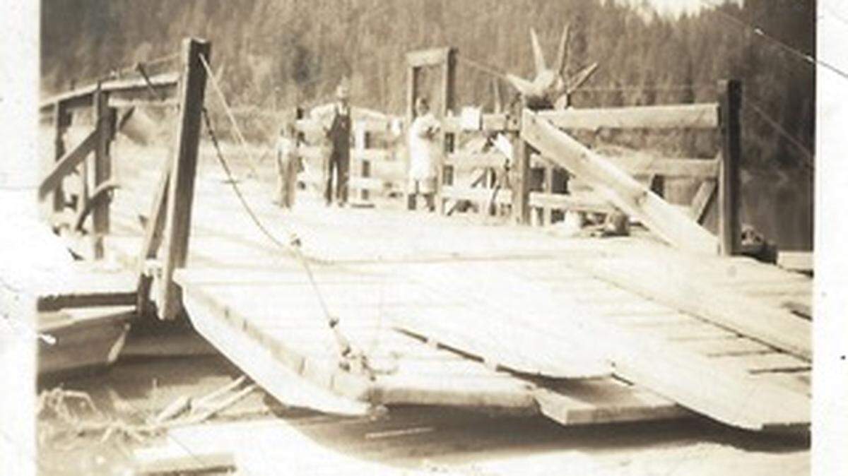 This tiny ferry was the only way out of Warland, Montana, by water. That’s Dorothy, age 8, at left center.