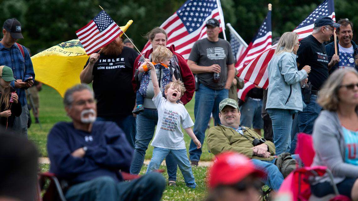 Although comedian Sacha Baron Cohen stole the show, about 500 people still attended the March For Our Rights 3 rally at Heritage Park in Olympia on Saturday. Here, five-year-old Gresham Davis cheers on a speaker as he attends the rally with his parents, Brandon and Aimee Davis of Olympia.