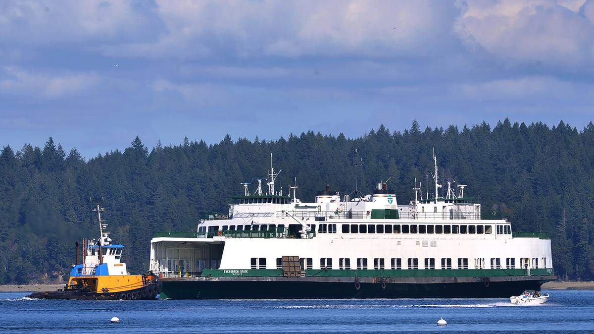 Making a good clip in Budd Inlet waters on Monday, the former Washington state ferry Evergreen State passes Boston Harbor near Olympia, heading north.