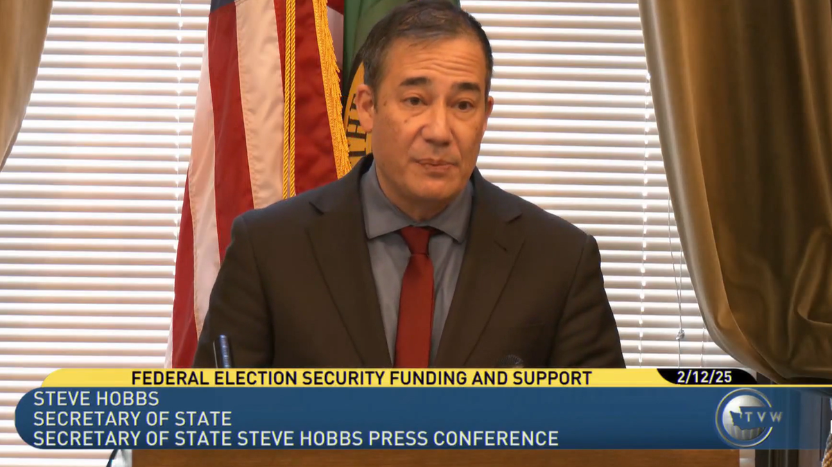 Secretary of State Steve Hobbs delivers remarks at a press conference in his Capitol office on Wednesday, Feb. 12, 2025.