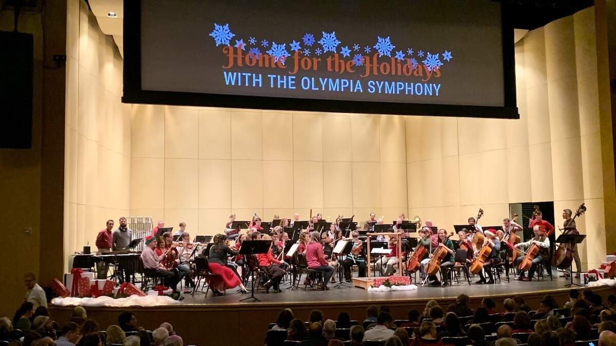 The Olympia Symphony Orchestra’s 2019 “Home for the Holidays” concert filled The Washington Center for the Performing Arts. This year, the orchestra is putting on a virtual version called “(At) Home for the Holidays.” 