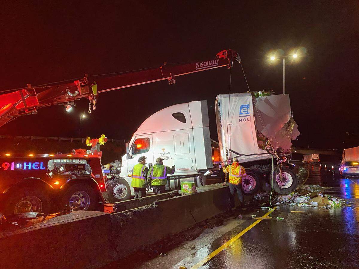 A two-semi truck collision on Jan. 28 caused motor oil to spill onto the road and into a stormwater drain that connects to Capitol Lake, which led to a cleanup operation by the Department of Ecology.