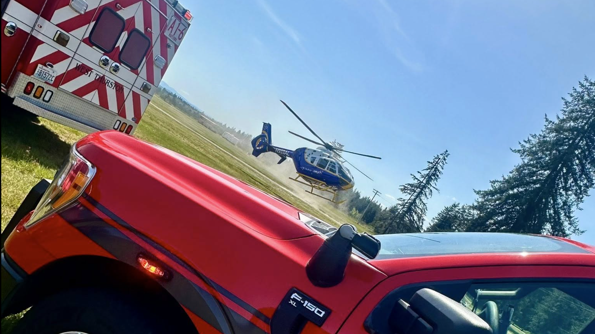 Airlift Northwest transported a person to a hospital Wednesday after fire crews rescued them from underneath a forklift in west Thurston County.
