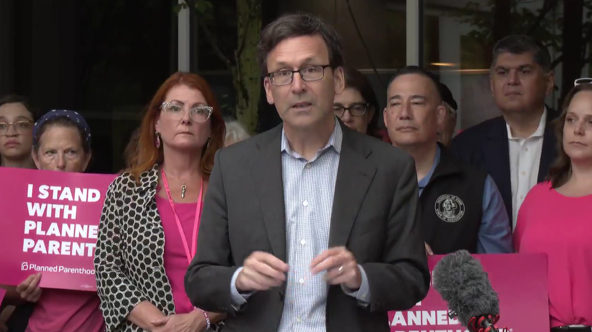 Gov. Bob Ferguson speaks at a news conference in Seattle on July 9, 2025.