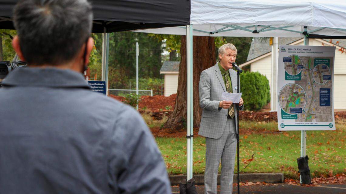 Thurston County Commissioner Tye Menser speaks prior to a ribbon cutting ceremony for the Mullen Road Project on Oct. 1. A judge ruled against a local activist who petitioned to recall Thurston County Commissioner Tye Menser for the second time.